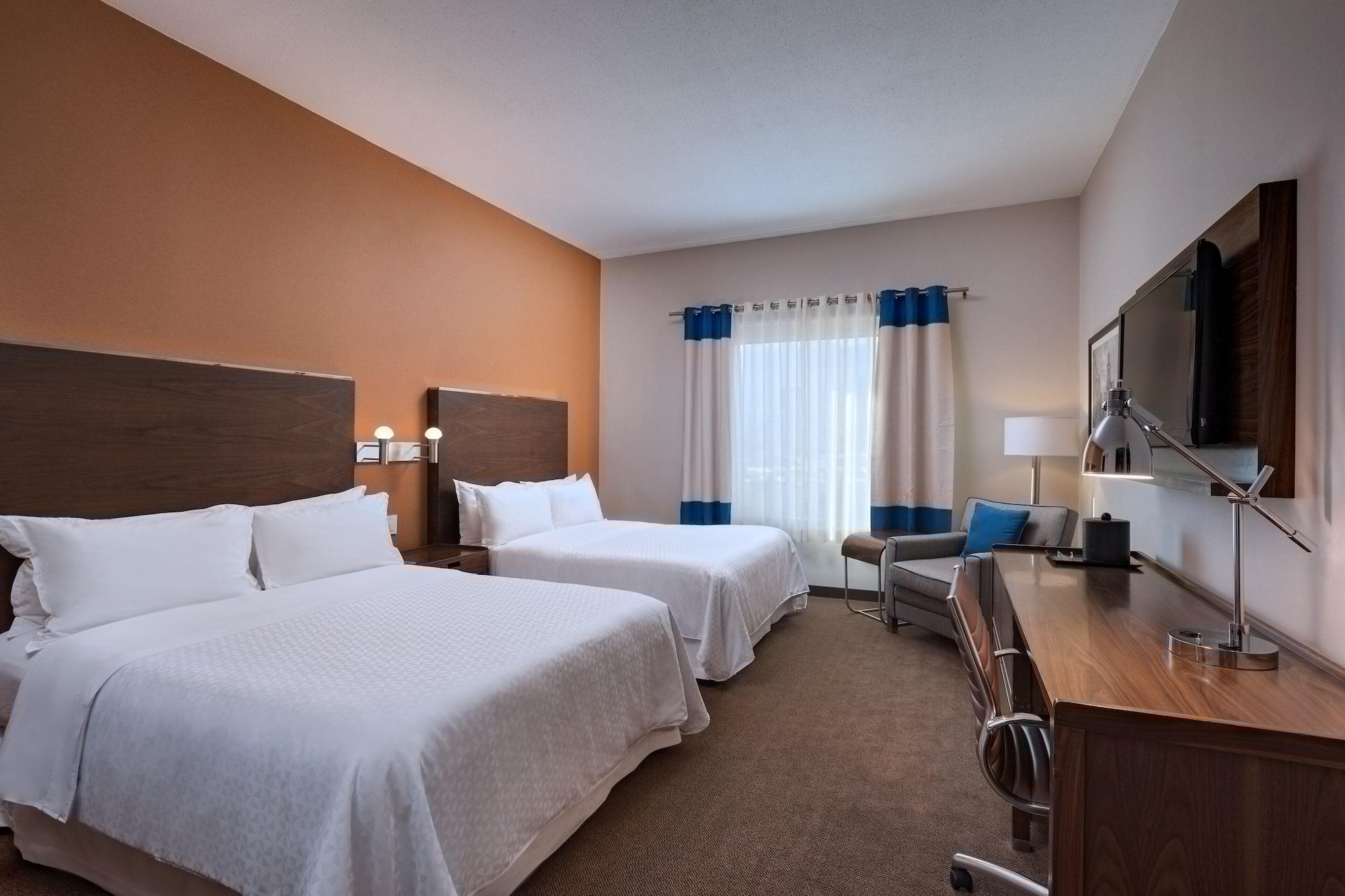Four Points By Sheraton Galerias Monterrey Exterior photo A typical guest room at an extended stay hotel