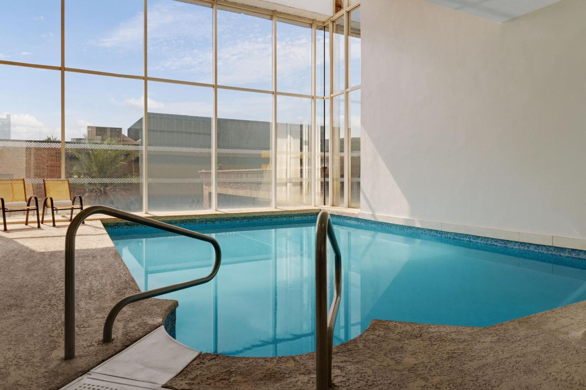 Four Points By Sheraton Galerias Monterrey Exterior photo The pool at the 1964 Olympic Village